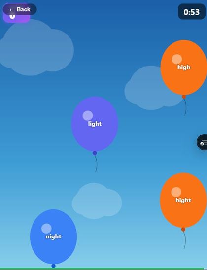 Balloon Pop screenshot: coloured balloons labelled with word spellings floating up the screen