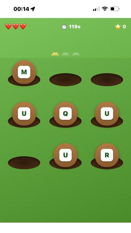 Whac-A-Word screenshot: moles holding the letters M, U, Q, U, U, R poking out of holes in a grassy field