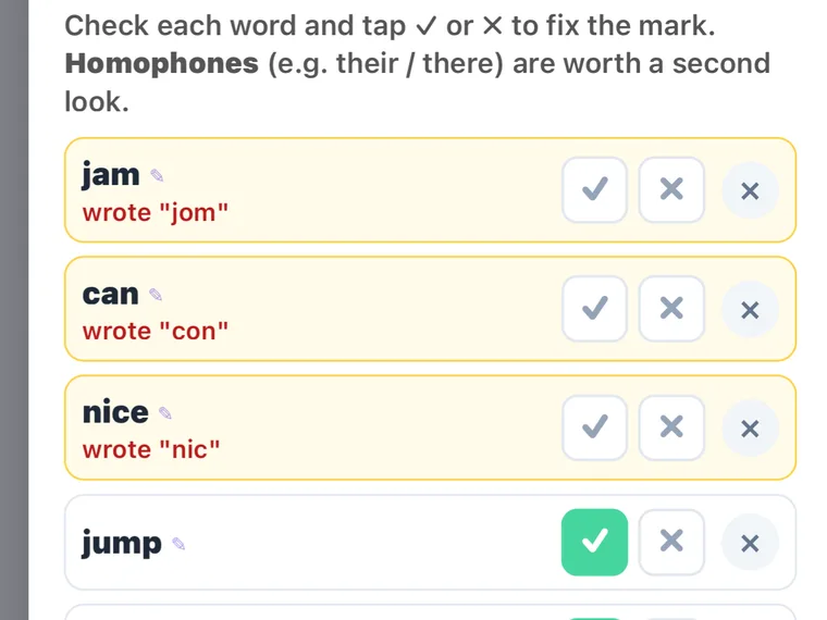 Paper practice review - the app has read a child's handwritten test and flagged misspellings while marking the correct words